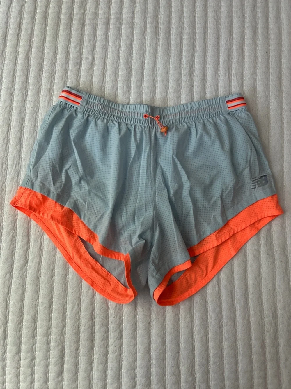 New Balance Light Blue Mesh Running Shorts with Orange Eyelets - Picture 1 of 8